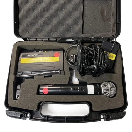 Shure Wireless System with T3-W Receiver, SM58 Microphone, and Transmitter.
